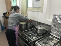 Woman cooking at a stove