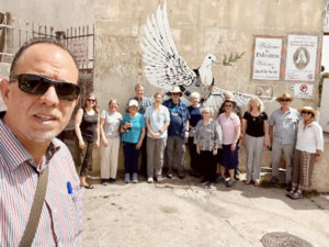 Usama with pilgrimage tour group